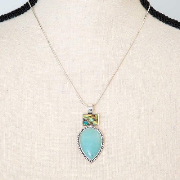 Southwestern pendant turquoise look pear stone, silver look accents Roman stamp - Picture 2 of 11